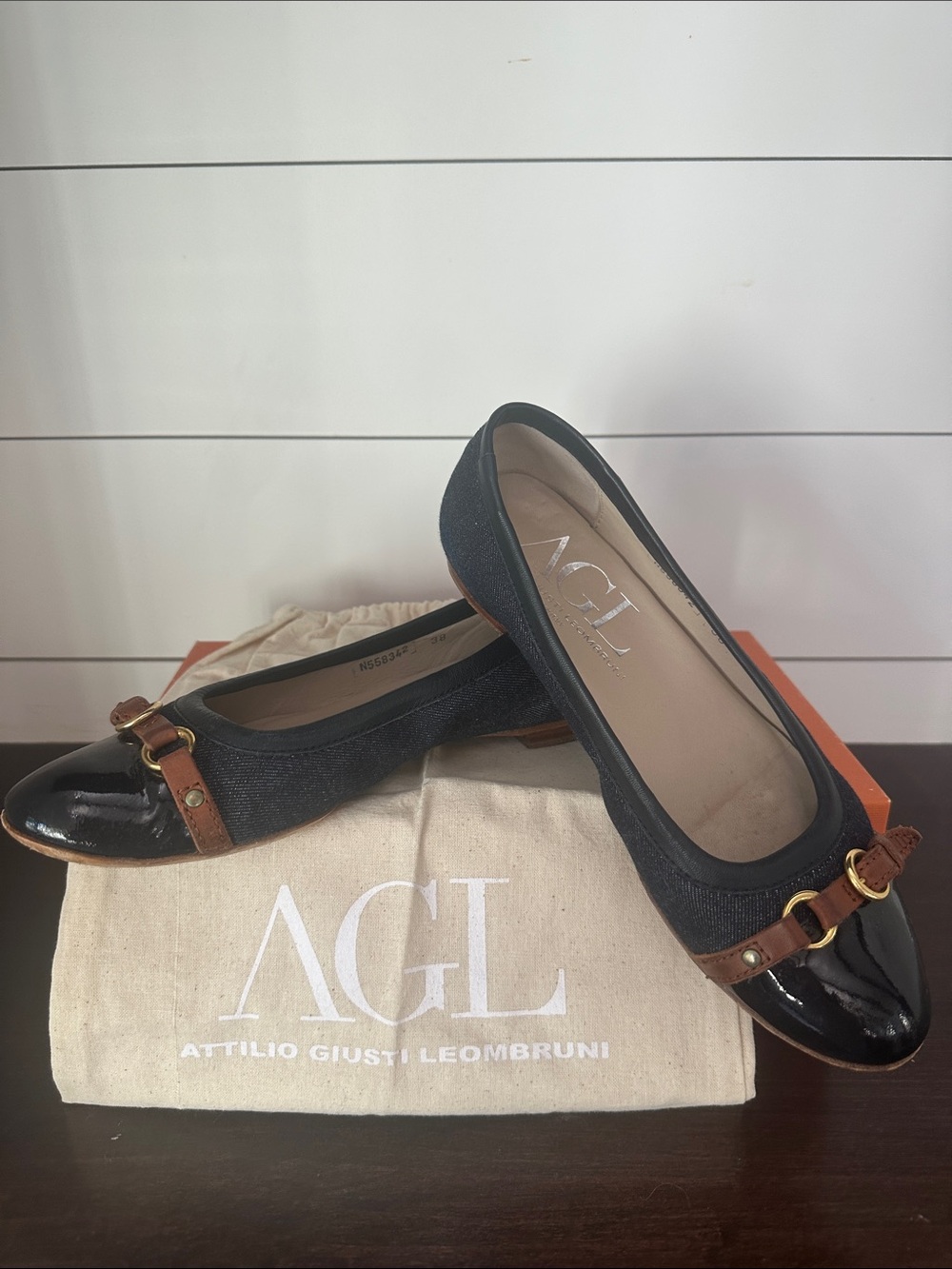 AGL Women's Black and Tan Loafers EUC